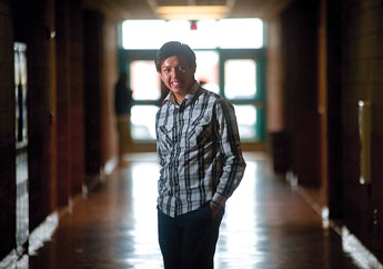 Kyle Tsosie stands a part from the norm at Gallup High School after earning an honorable mention in the Congressional Art Competition for a photo mosaic art work chosen by State Representative Ben Ray Lujan. &copy; 2011 Gallup Independent / Adron Gardner 